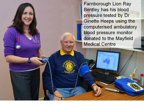 Ray Bentley tests the blood pressure monitor at Mayfield Medical Centre with Dr Jeanette Heaps