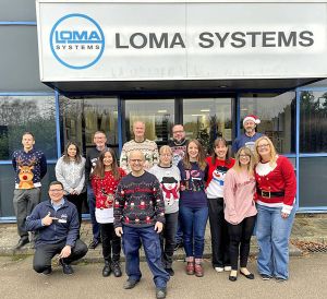 A group of Loma Systems staff pictured on Christmas Jumper Day