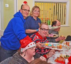 Farnborough & Aldershot Lions serving the Christmas spread at Parkside