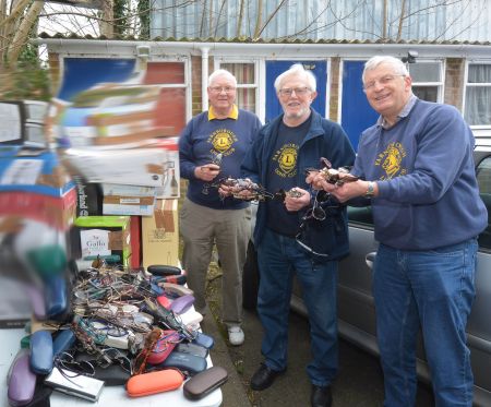 Sorting through the recycled spectacles for shipping to Medico France